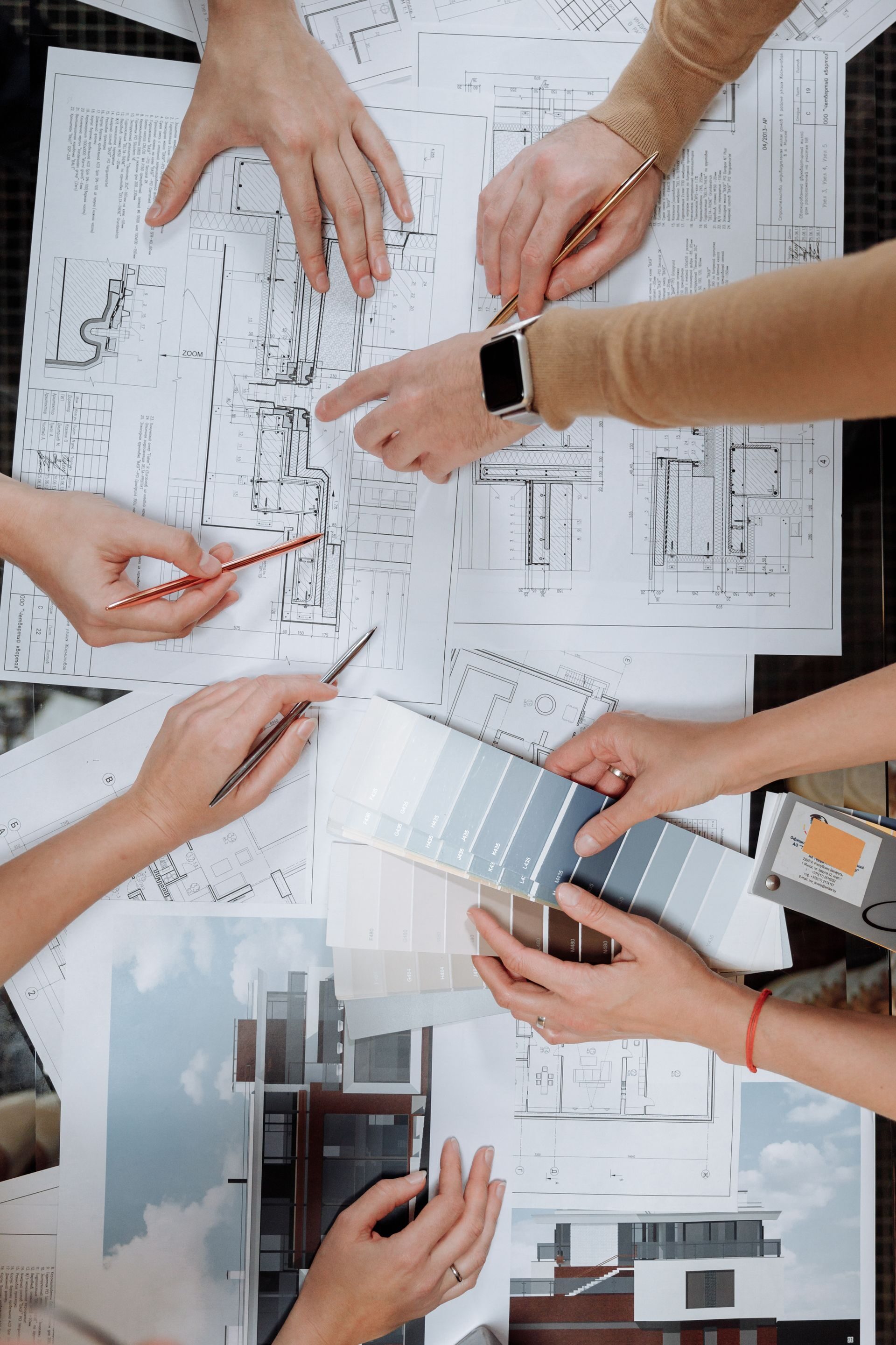 Construction estimator reviewing project plans and preconstruction details